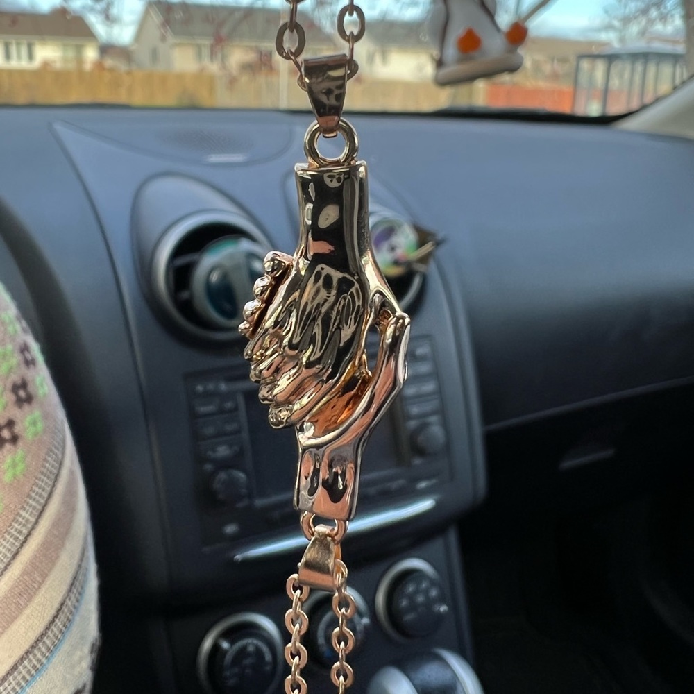 gold magnetic holding hands necklace